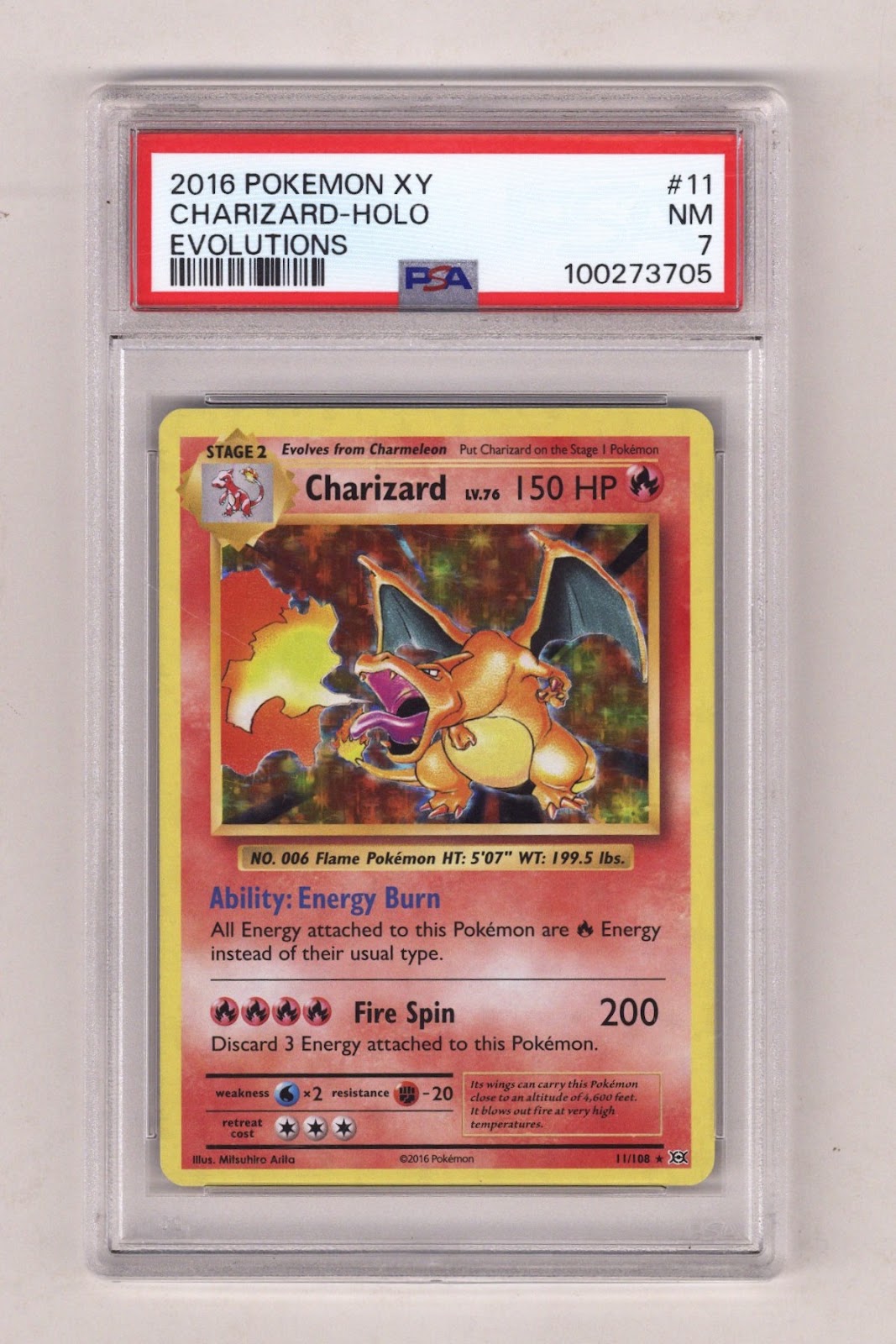 Pokemon Xy Evolutions Charizard - Holo PSA Near Mint 7 (2016) | CaptCan Comics
